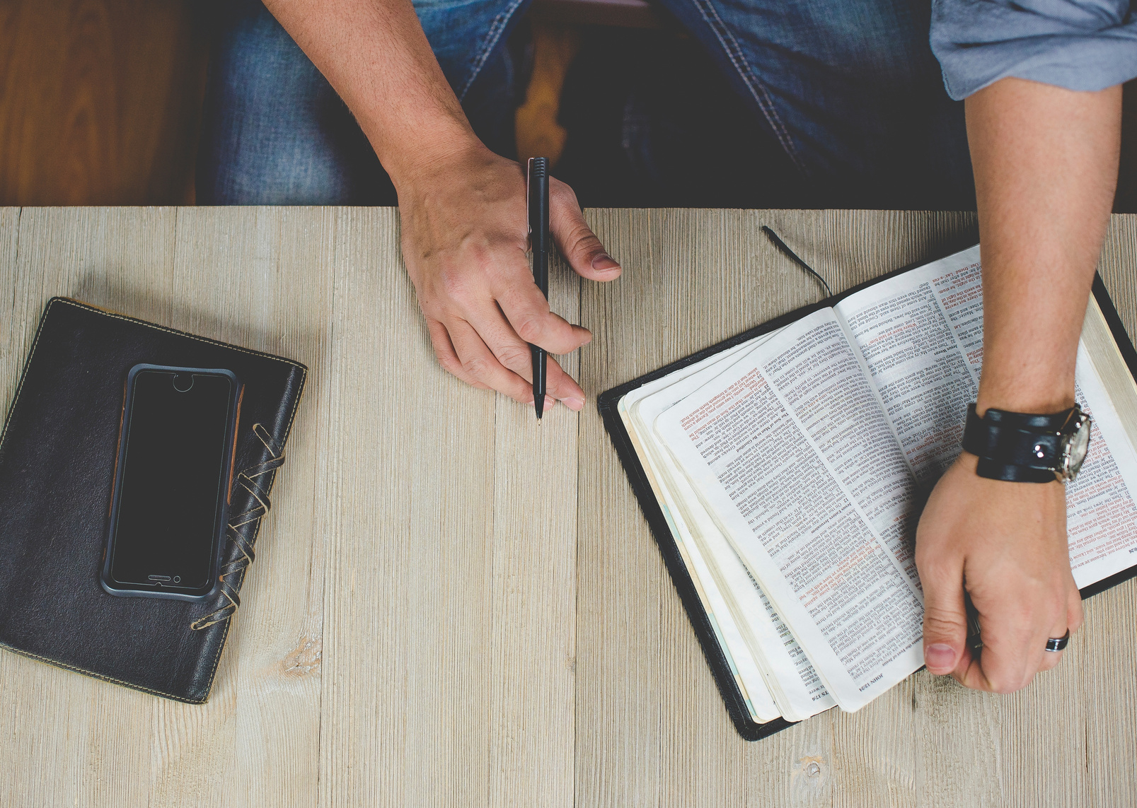 Man Reading a Bible Top View